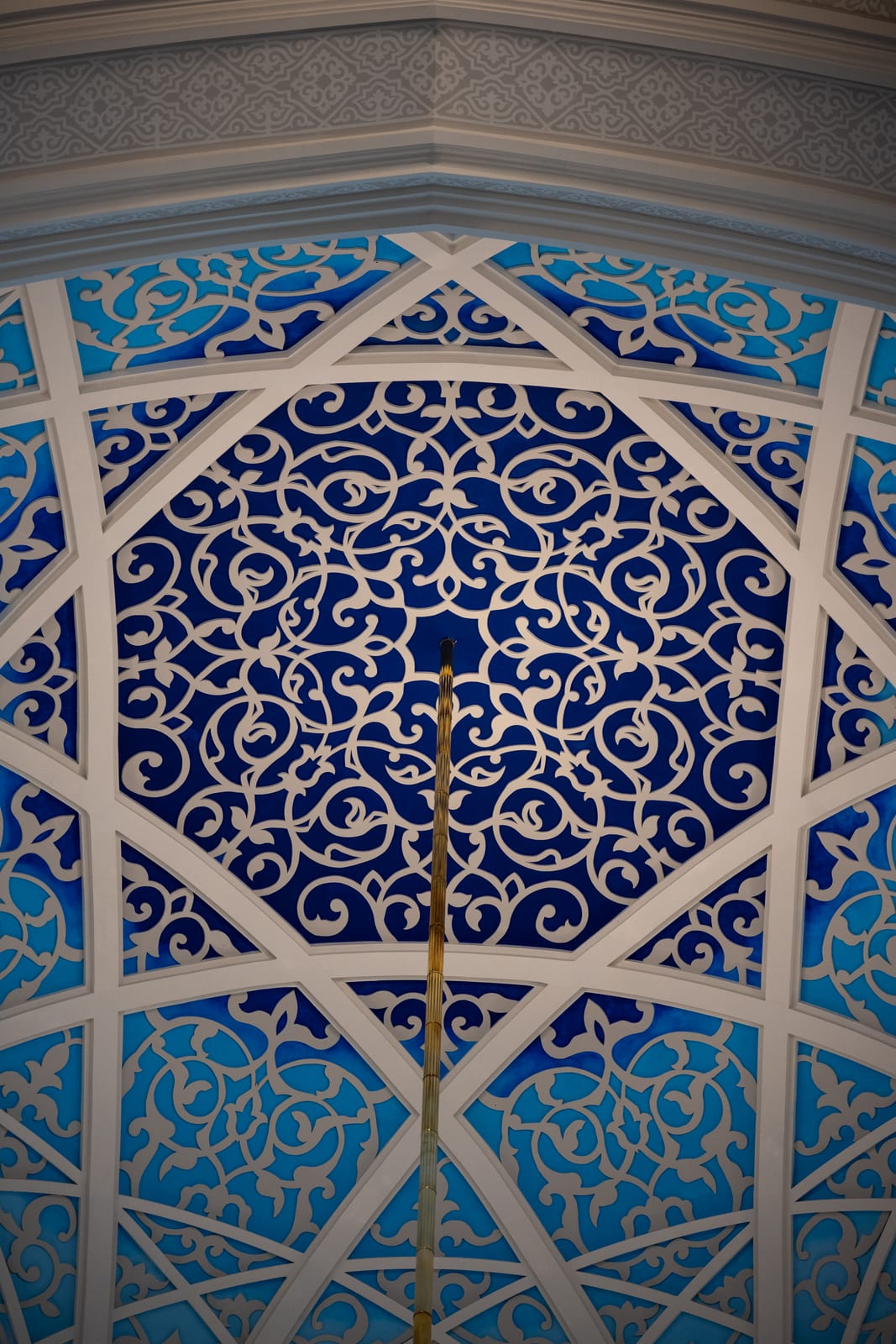 Blue and white ornamental ceiling pattern in close detail