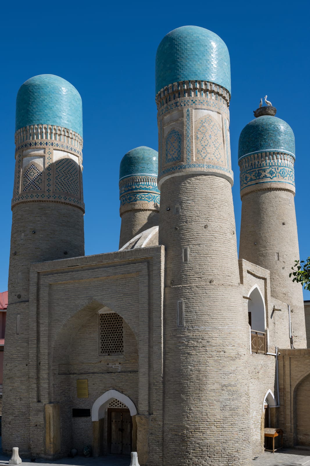 Chor Minor with its four turquoise-capped towers against deep blue sky