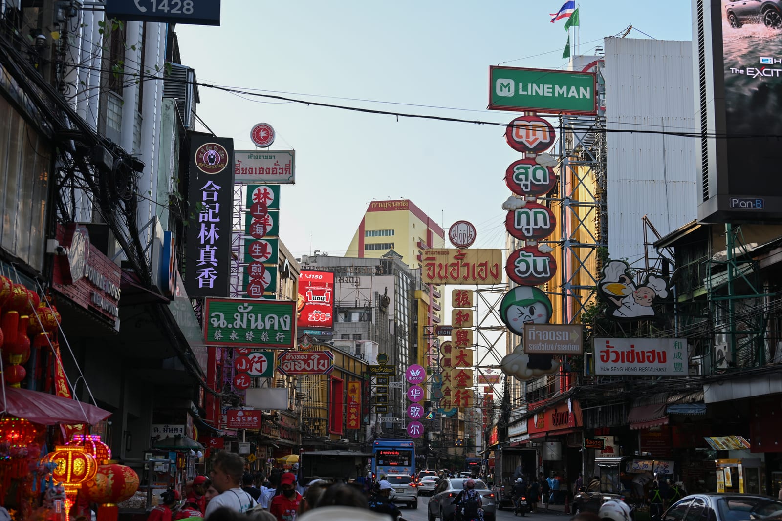 Yaowarat Road Chinatown street with stacked neon signage